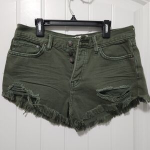We The Free by Free People green distressed denim shorts